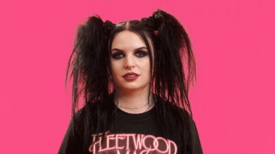 Woman With Pigtails In Fleetwood Mac Shirt GIF