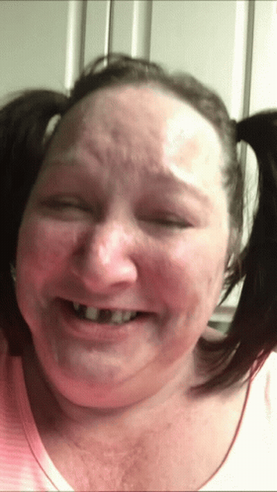 Woman With Pigtails Smiling GIF