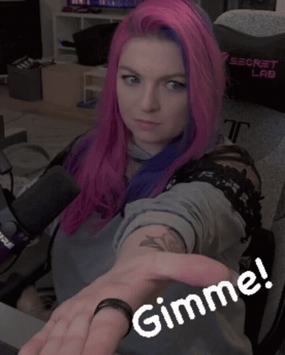 Woman With Pink And Purple Hair Pointing GIF
