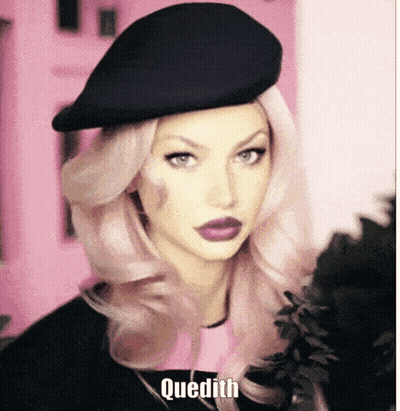 Woman With Pink Hair and Black Hat Saying Quedith