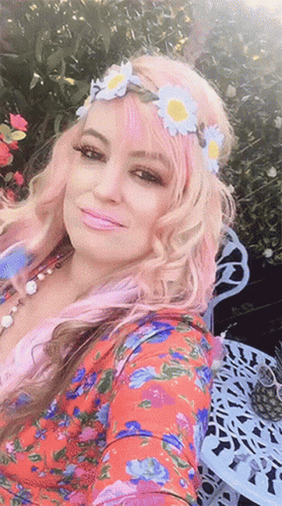 Woman With Pink Hair And Flower Crown GIF
