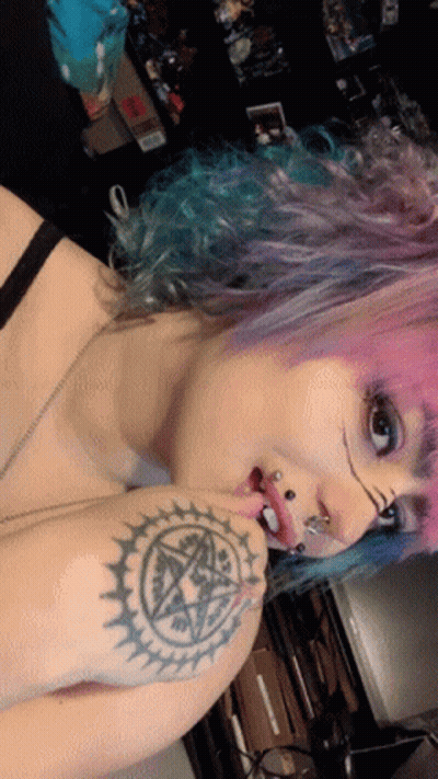 Woman With Pink Hair And Pentagram Tattoo GIF
