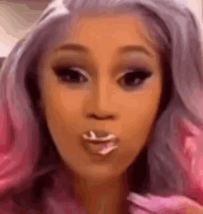 Woman With Pink Hair Blowing Kiss With Toothpick GIF
