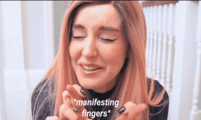 Woman With Pink Hair Crying Manifesting Fingers GIF