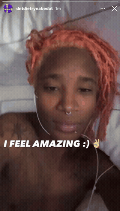 Woman With Pink Hair Headphones Saying I Feel Amazing GIF
