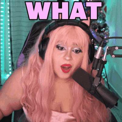Woman With Pink Hair Holding Microphone GIF