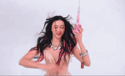 Woman With Pink Hair Holding Pink Microphone GIF