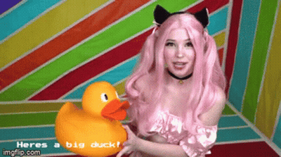Woman With Pink Hair Holding Rubber Duck Saying Heres A Big Duck GIF