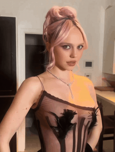 Woman With Pink Hair In Black Dress GIF