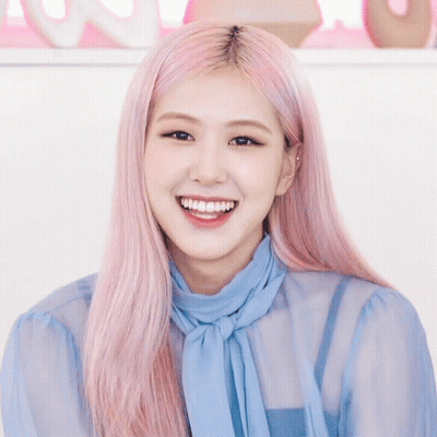 Woman With Pink Hair In Blue Shirt And Tie Smiling GIF