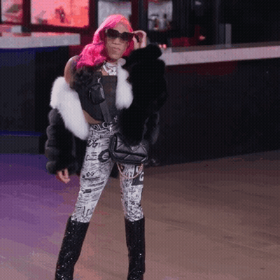 Woman With Pink Hair In Fur Coat GIF