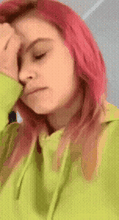 Woman With Pink Hair In Green Hoodie GIF