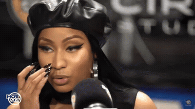 Woman With Pink Hair Making Funny Face GIF