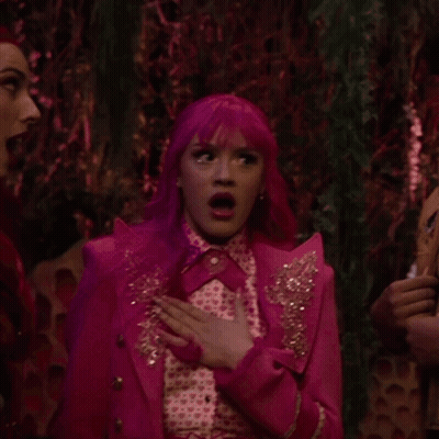 Woman With Pink Hair Next To Another Woman GIF
