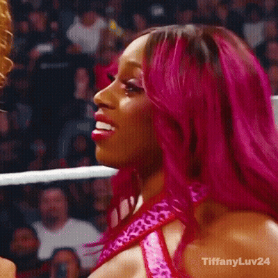 Woman With Pink Hair Smiling Holding Wrestling Championship Belt GIF