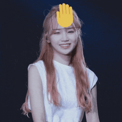 Woman With Pink Hair Smiling With Yellow Hand GIF