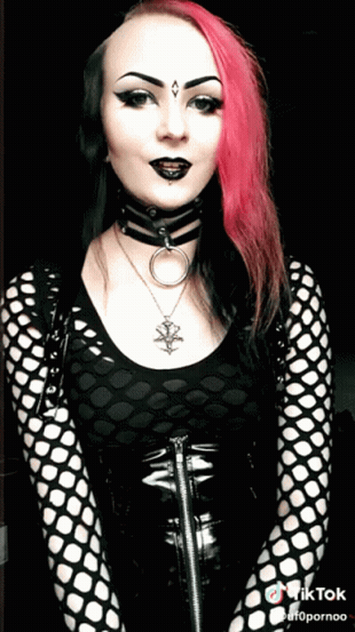 Woman With Pink Hair Wearing Choker And Necklace GIF