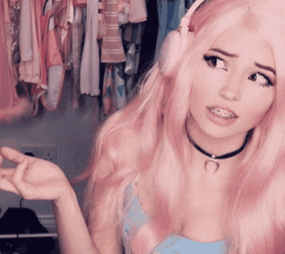 Woman With Pink Hair Wearing Headphones And Choker GIF