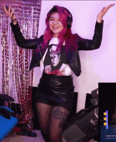 Woman With Pink Hair Wearing Headphones GIF