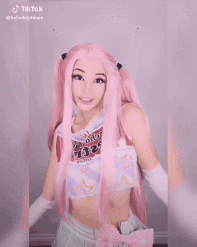 Woman With Pink Hair Wearing Vibe Shirt GIF
