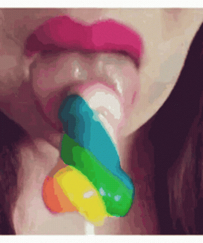 Woman With Pink Lips Licking Colorful Lollipop GIF