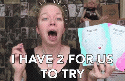 Woman With Pins Holding Focusspot GIF