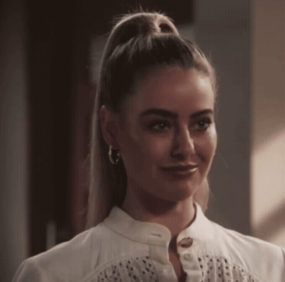 Woman With Ponytail And Hoop Earrings GIF