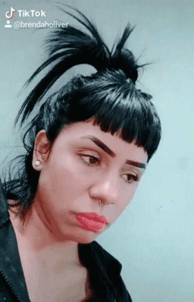 Woman With Ponytail And Nose Ring On TikTok GIF