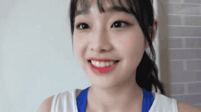 Woman With Ponytail And Red Lipstick GIF