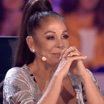 Woman With Ponytail Sitting At Microphone GIF