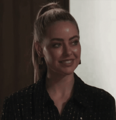 Woman With Ponytail Smiling GIF
