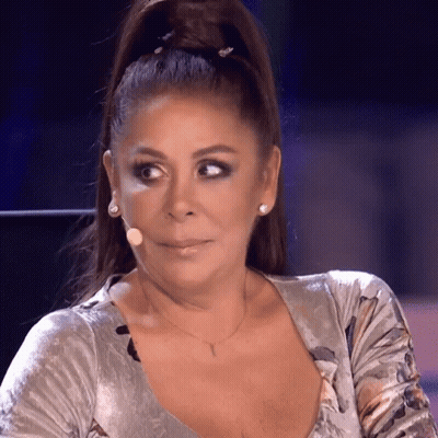 Woman With Ponytail Wearing Y Necklace GIF