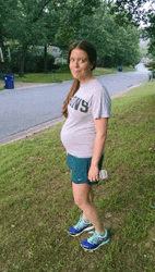 Woman With Pregnant Belly Jogs GIF
