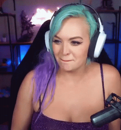 Woman With Purple And Green Hair Wearing Headphones And Microphone GIF