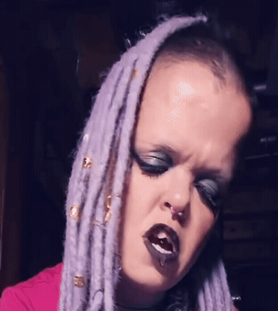 Woman With Purple Dreadlocks And Nose Ring GIF