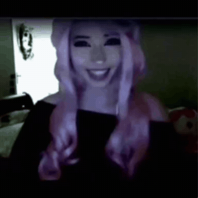 Woman With Purple Hair And Black Eyes Smiling GIF