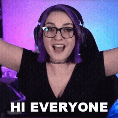 Woman With Purple Hair And Glasses Wearing Headphones Says Hi Everyone GIF