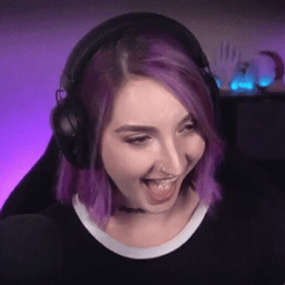 Woman With Purple Hair And Headphones Making Funny Face GIF