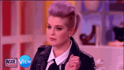 Woman With Purple Hair And Leather Jacket GIF