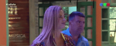 Woman With Purple Hair And Man At La Pena Sign GIF