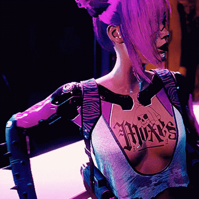 Woman With Purple Hair And Pixies Tattoo GIF