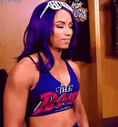 Woman With Purple Hair And Sunglasses In Blue Top GIF