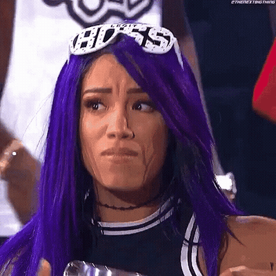 Woman With Purple Hair And Sunglasses Making A Face GIF