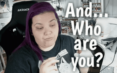 Woman With Purple Hair In AKRacing Chair Asking Who Are You GIF