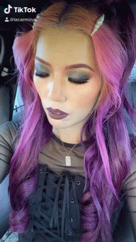 Woman With Purple Hair In Black Top And Necklace GIF