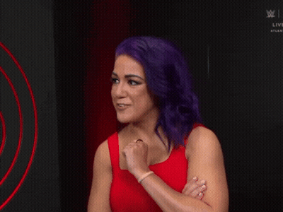 Woman With Purple Hair In Red Dress GIF