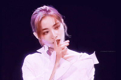Woman With Purple Hair In White Collared Shirt GIF