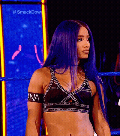 Woman With Purple Hair In Wrestling Ring Wearing Ana Bra GIF
