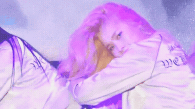 Woman With Purple Hair Laying Down Eyes Closed GIF