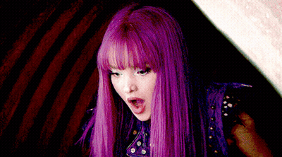 Woman With Purple Hair Making Funny Face GIF